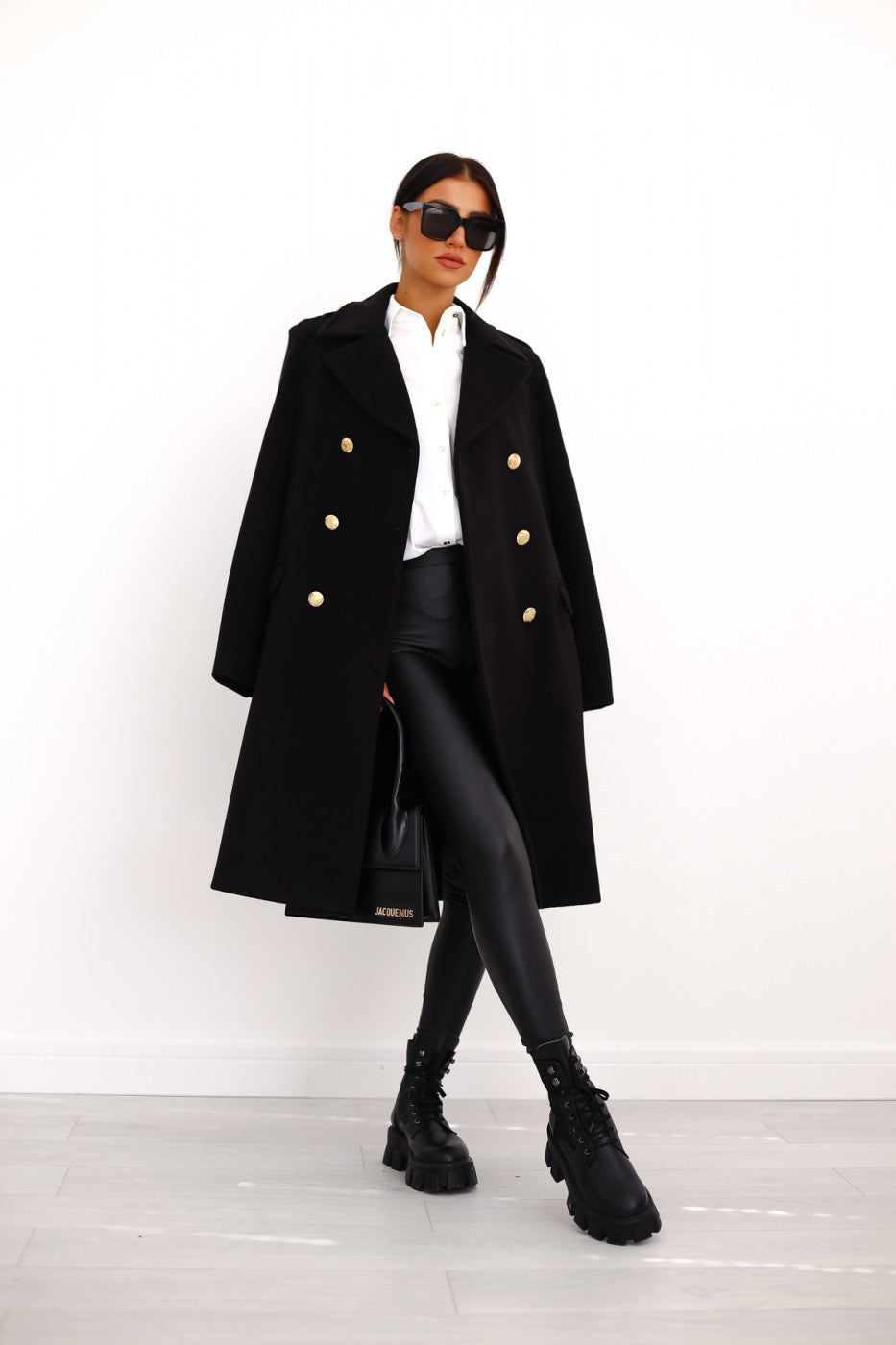 Elegant Women's Double-Breasted Long Winter Coat with Gold Button Accents and Structured Silhouette