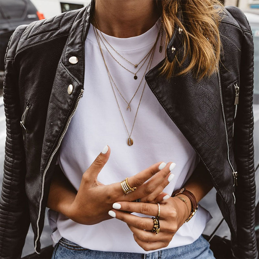 Stylish Women's Leather Biker Jacket with Ribbed Sleeves and Angled Zip Details - Edgy Moto Fit Outerwear