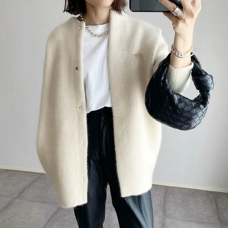Women's White Knitted Cardigan Sweater with Button Closure - Elegant, Comfortable, Relaxed Fit for Casual or Work Settings
